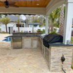 Outdoor Living Inc. Designing Durable Outdoor Kitchens in Coastal Regions: Materials That Withstand the Salty Air